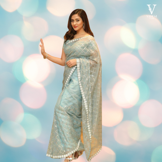 Carla Stunning Faux Georgette Sequined Saree With Stone Work Blouse