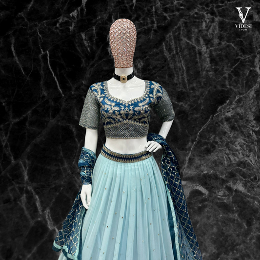 Crisha Radiant Faux Georgette Lehenga With Soft Net Choli And Dupatta