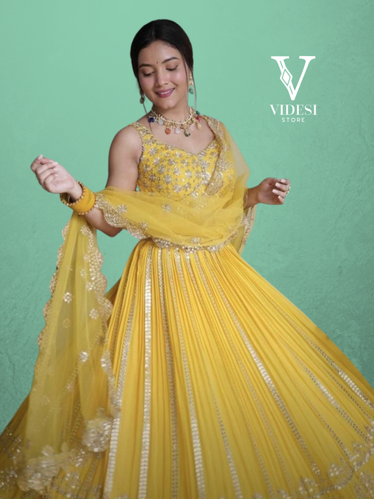 Amaji Vibrant Yellow Georgette Embroidered Sequined Lehenga