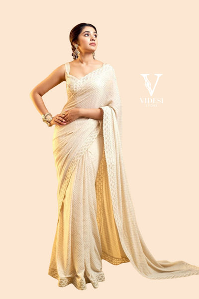 Myra Charming White Faux Georgette Mukesh Work Sequined Saree
