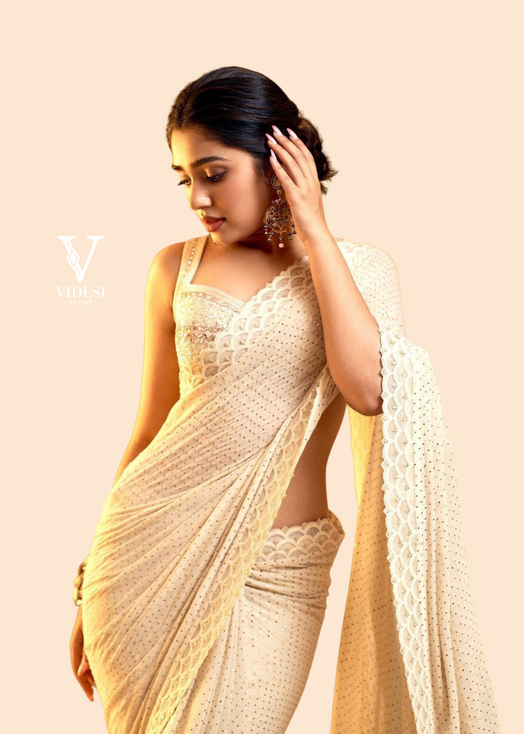 Myra Charming White Faux Georgette Mukesh Work Sequined Saree
